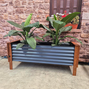 Image of the Mr Fox in a Box wicking planter box featuring a self-watering system for sustainable, organic gardening.