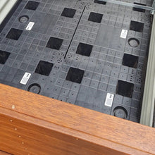Load image into Gallery viewer, Close-up image of the wicking cells in the Mr Fox in a Box planter box, highlighting the self-watering system designed for optimal moisture retention and efficient organic gardening.
