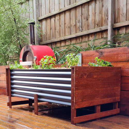 Image of the Mr Fox in a Box wicking planter box featuring a self-watering system for sustainable, organic gardening.